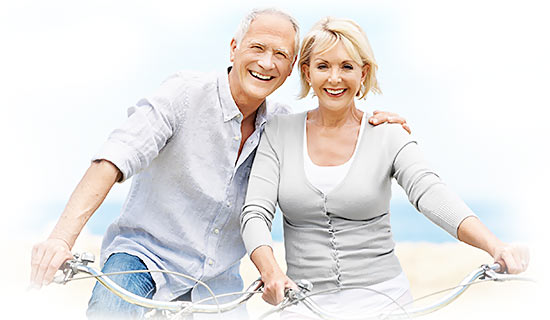 Happy Senior Couple Riding Bikes