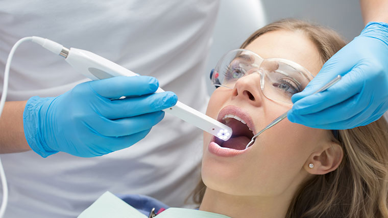 Doctor using Intraoral Camera